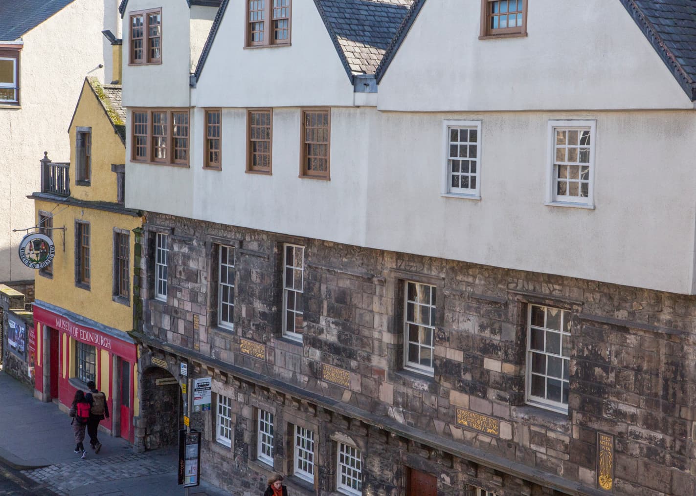 A building exterior, showcasing architectural details and colourful walls