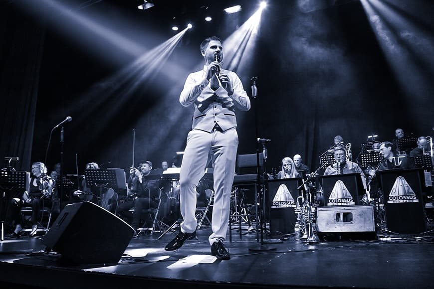 Photo of the Story of Swing band and singers performing on stage