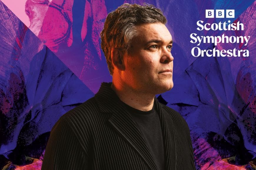 Photo of Ryan Wigglesworth on pink and purple background