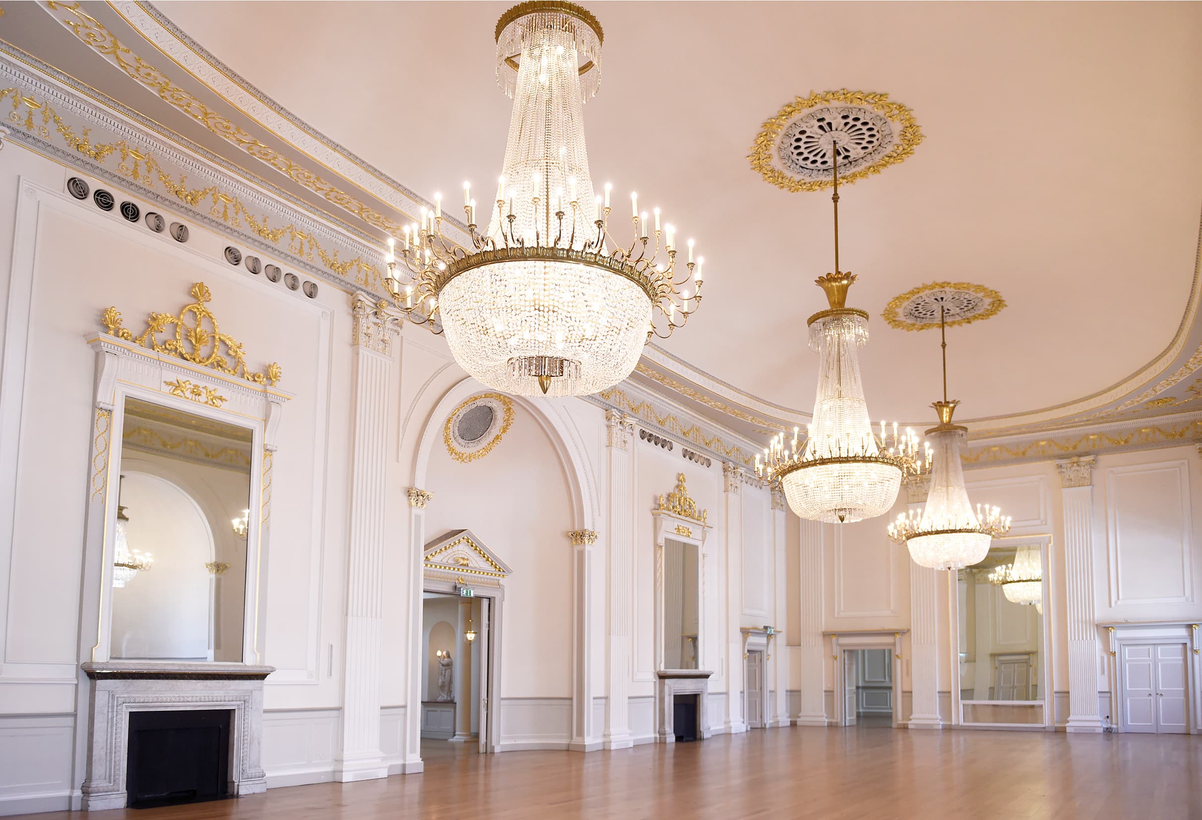 Ballroom image showing chandeliers and infinity mirror