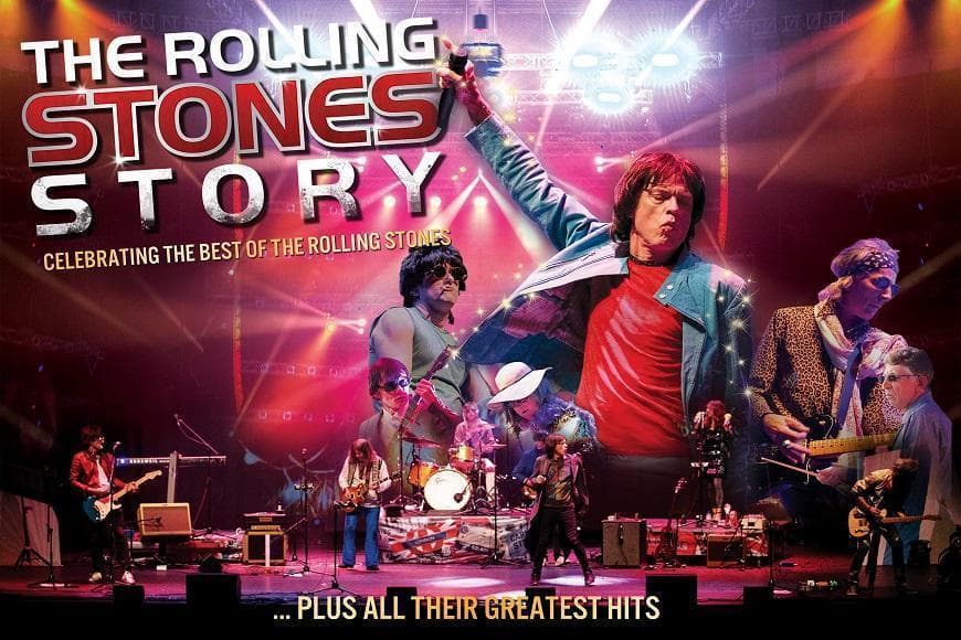 Band members dressed as The Rolling Stones performing on stage