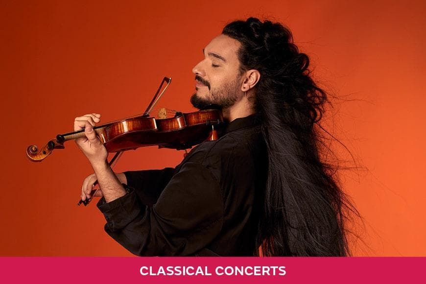 Photograph of soloist Nemanja Radulović playing the violin