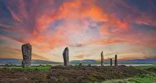 Photo of standing stones at sunset